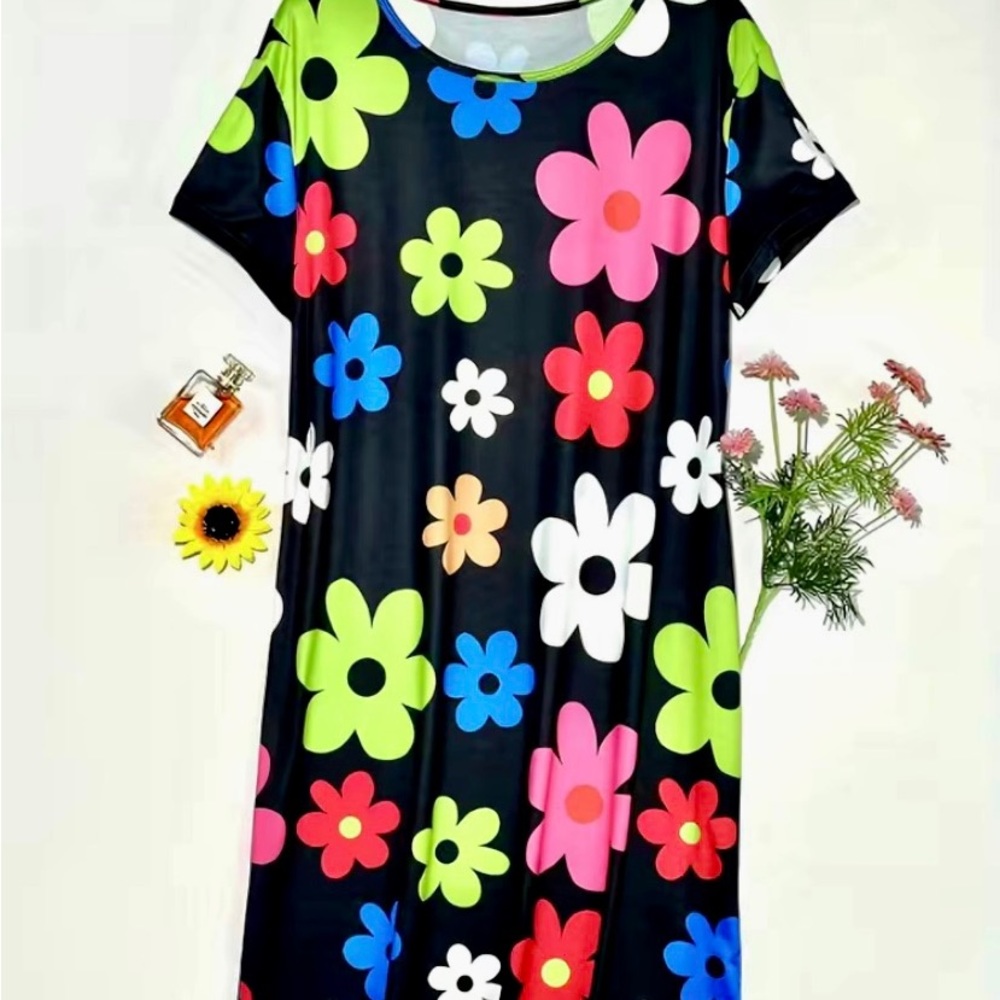Super cute, casual, floral print dress. Size 14. Rounded neck and short sleeves.